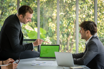 Businessman  meeting with his colleague  in the meeting room  office