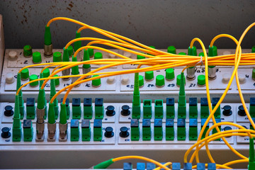 Global communications can be tricky. Bunch of fiber optic cords inside the switch