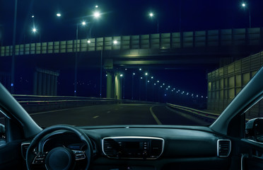 View from the car on the night multi-level highway