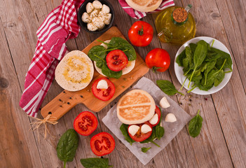 Tigella bread with spinach and tomatoes. 
