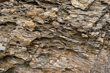 Stones and layer of stone at the coast of sea.