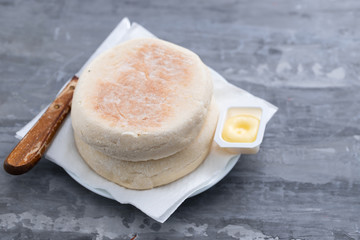 typical portuguese bread of Madeira Bolo do caco with butter