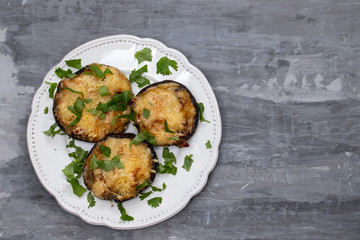 stuffed mushrooms with cheese and herbs on white beautiful dish