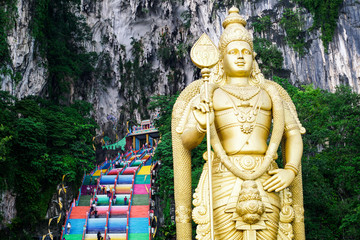 Batu cave, statue of Lord Murugan in Malaysia. Colorful steps at the entrance to the cave