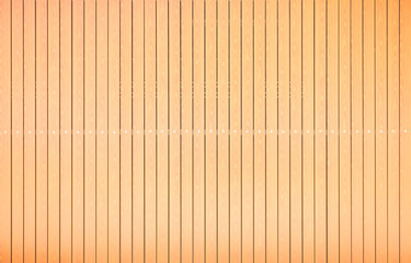 Wooden wall texture as background.