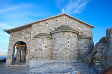 Fototapeta na wymiar Holy Mount Athos, with the temple and main Athos cross