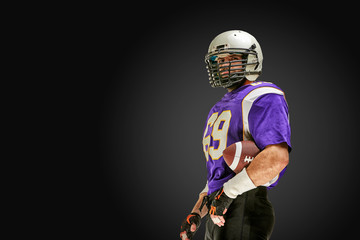 American football player in action with ball