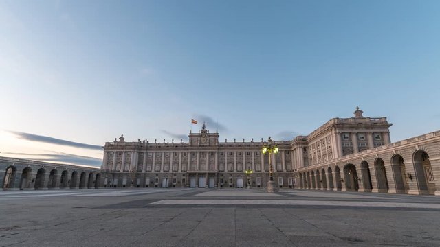 Madrid Spain time lapse 4K, city skyline day to night timelapse at Royal Palace of Madrid