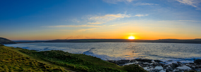 Panoramic View of a Sun Set over Daymer Bay