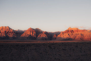 Naklejka na ściany i meble rugged desert landscape at sunrise
