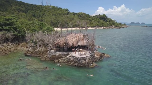 Drone flying above koh Raham area, Haad Son sand beach and Secret beach at koh Phangan island,Thailand,no color grading