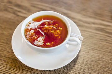 Tea with nice with rising cream clouds