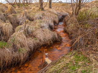 Iceland red water lakes landscape due to the volcanic underground