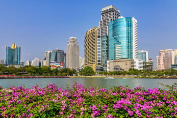 Fototapeta premium Tall buildings in Benchakitti Park in Bangkok, Thailand