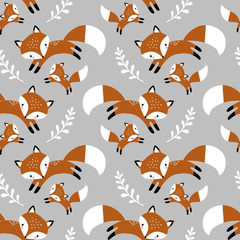 Seamless vector pattern with cute hand drawn foxes and leaves. Perfect for textile, wallpaper or print design. 