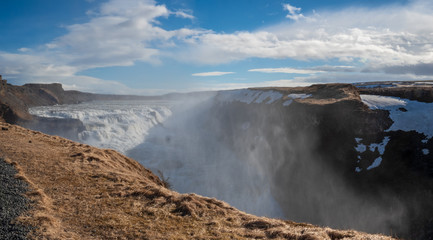 The famous Iceland Waterfall Gullfoss with huge water steam in the air