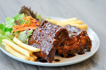 barbecue pork rib with french fries