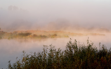 Naklejka na ściany i meble Morning mist over the river