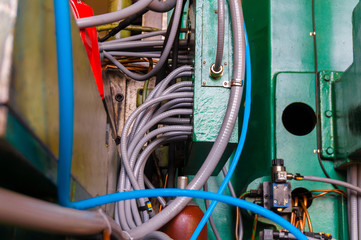 Hydraulic system of the machine, oil under pressure in hydraulic pipes, repair of industrial...