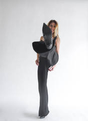 Portrait Young Blond Woman Posing Black Bra Pants Studio