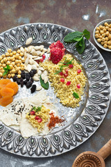 Millet salad with pomegranate and apricot