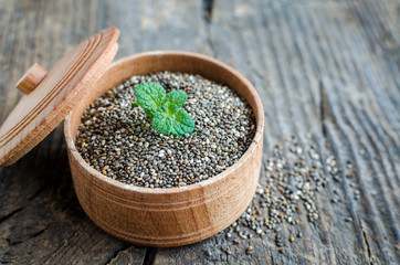 Healthy Chia seeds in a wooden bowl