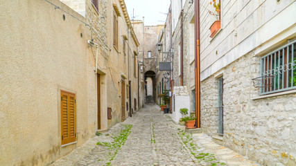 Fototapeta na wymiar 16502_The_small_narrow_road_in_a_village_in_Erice_Trapani_Italy-101.jpg