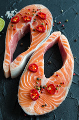 Two fresh raw salmon steaks