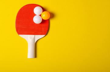 table tennis game on color yellow background, top view
