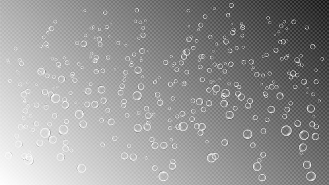 Small air bubbles on transparent background. Texture for sparkling water, champagne, underwater world.
