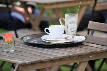 cup of coffee on wooden table