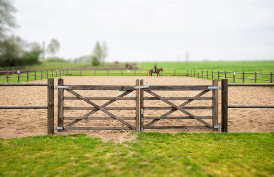 Wooden gate to an equine training course