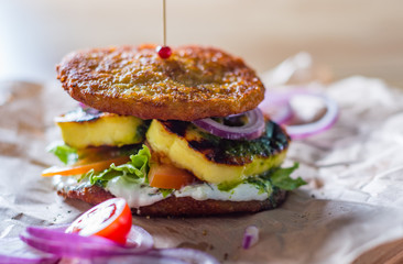potato pancakes with fried cheese, vegetables and sauce