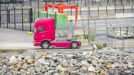 20537_A_red_truck_head_parked_on_the_seaport_in_Stockholm_Sweden-114.jpg