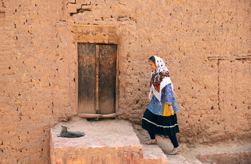 beautiful Iranian lady in a village of Abyaneh