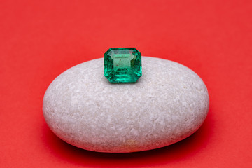 Green Emerald on White Stone