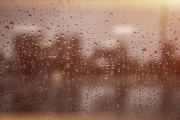 rainy window in rays of sun texture