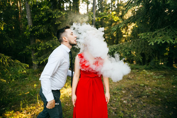 Smoking businessman kissing beautiful young blonde girl with innocent kind face, piercing, eyes...