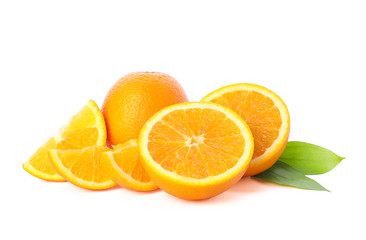 Ripe oranges with leaves isolated on white background. Citrus food