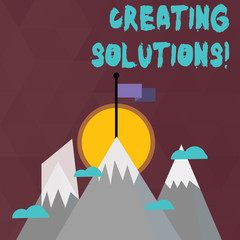 Conceptual hand writing showing Creating Solutions. Concept meaning Make ways to solve a problem or dealing with situation Three High Mountains with Snow and One has Flag at the Peak