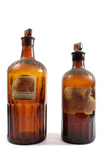 Vintage Brown Poison Bottles on White Background