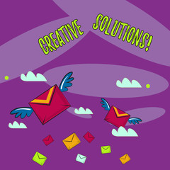 Word writing text Creative Solutions. Business photo showcasing mental process of creating a solution to a problem Many Colorful Airmail Flying Letter Envelopes and Two of Them with Wings