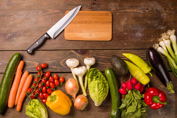 Fresh vegetables on wooden background