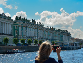 Russia, St. Petersburg Summer unknown woman taking a picture