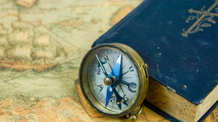 3405_Zoom_out_view_of_the_compass_with_the_book.jpg