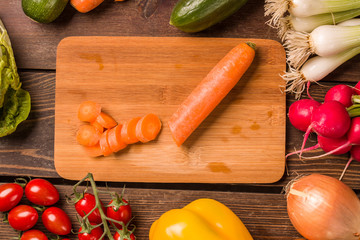 Carrot and other fresh vegetables and ingredients for cooking