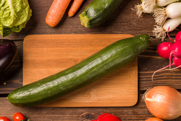 Cucumber and other fresh vegetables and ingredients for cooking