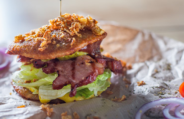 potato pancakes with meat, cheese, vegetables and sauce