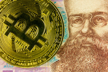 Bitcoin against the background of Ukrainian hryvnia, a portrait of Grushevsky.