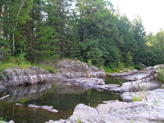 Naklejka na ściany i meble mountain river, rapids, rapid river among the rocks